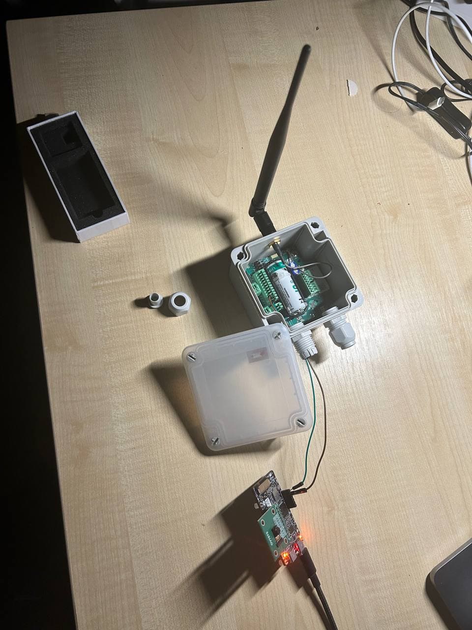 Embedded hardware enclosure housing the on-camera compute